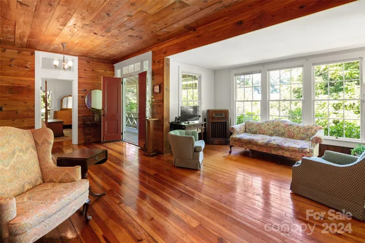 Enter from front doors into living area and wide entrance hallway