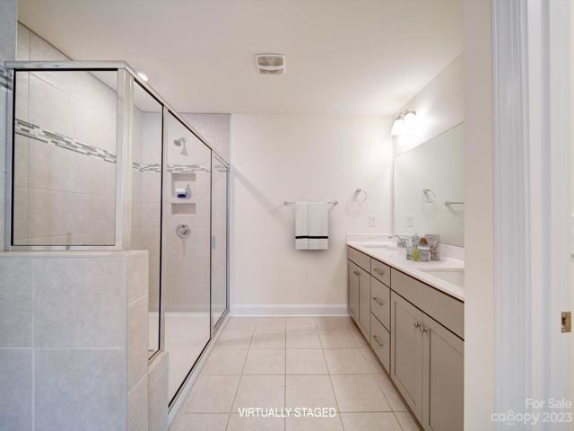 Primary bathroom (Virtually Staged)