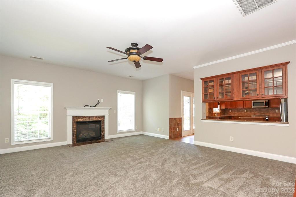 Spacious Great Room w/Fireplace. New carpet and freshly painted.