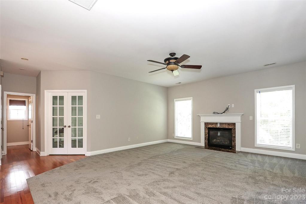 Spacious Great Room w/Fireplace. New carpet and freshly painted.
