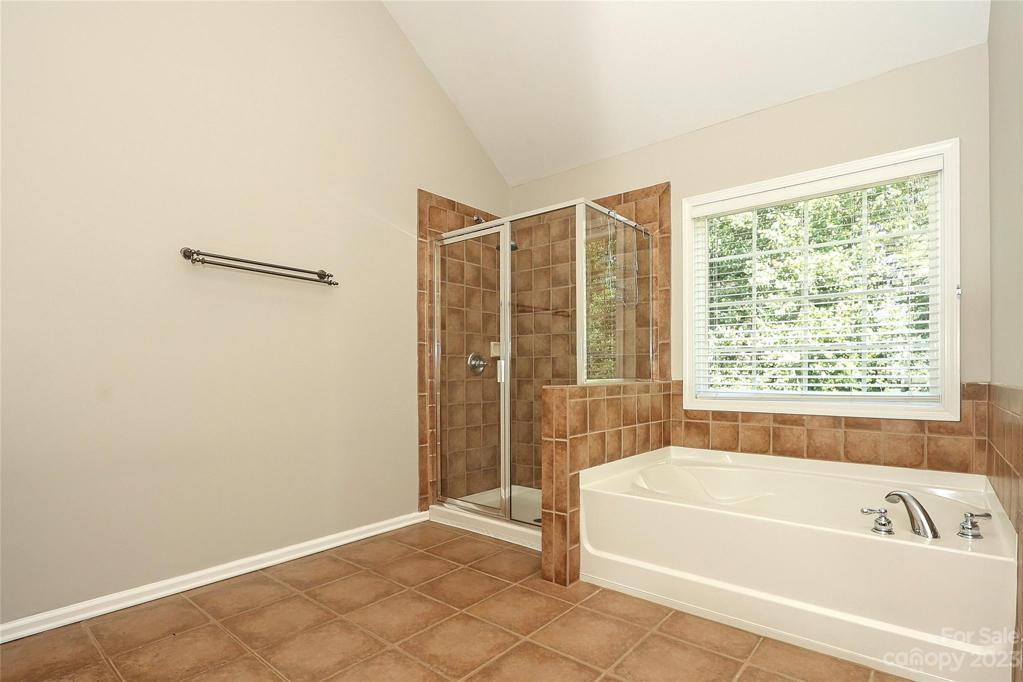 Large Master Bath w/Garden Tub and separate glass enclosed shower.