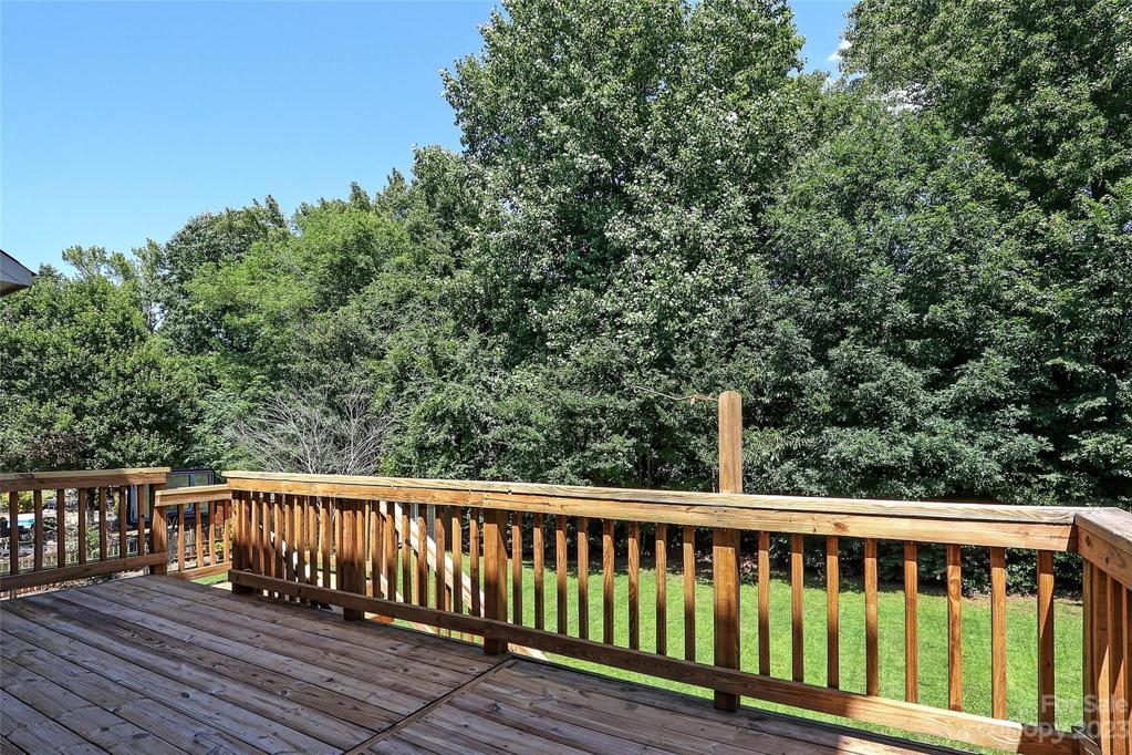 Large Deck on treed lot.