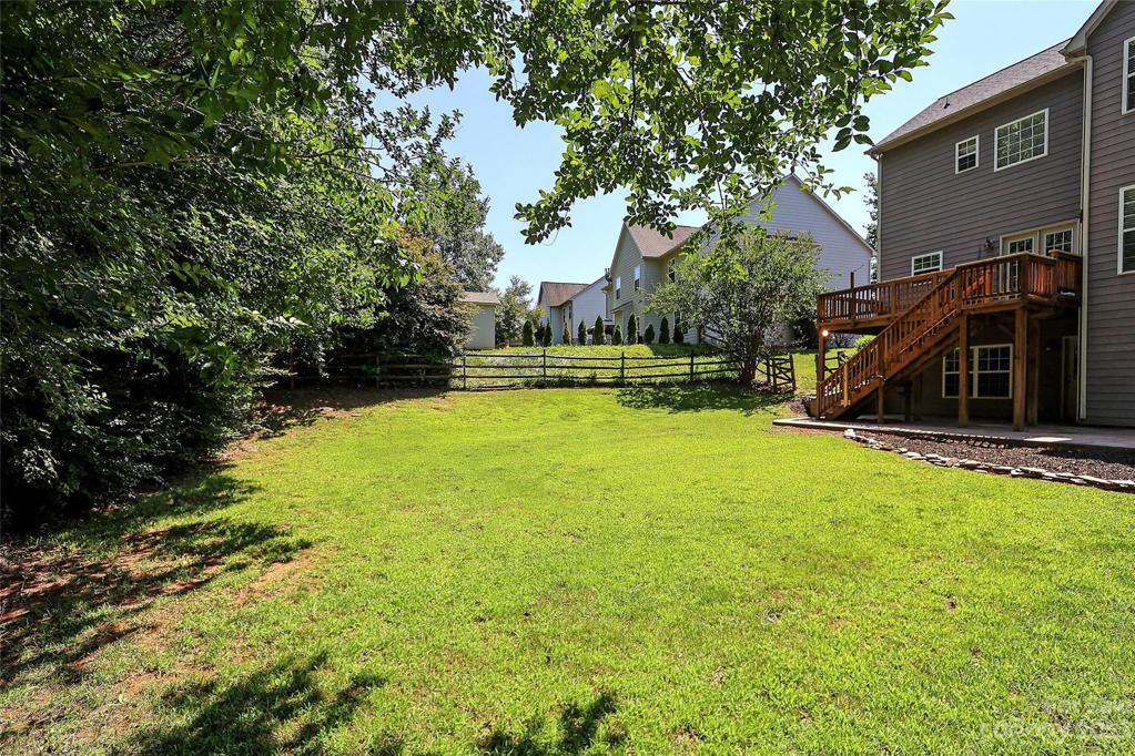 .37 acre fenced lot.