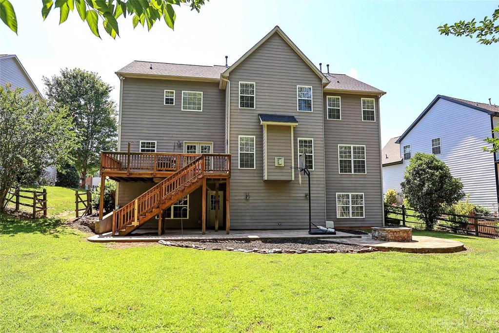 Walk Out Basement that leads to Custom Patio, Fire Pit.