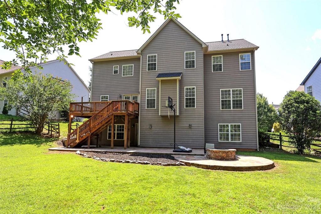 Walk Out Basement that leads to Custom Patio, Fire Pit.