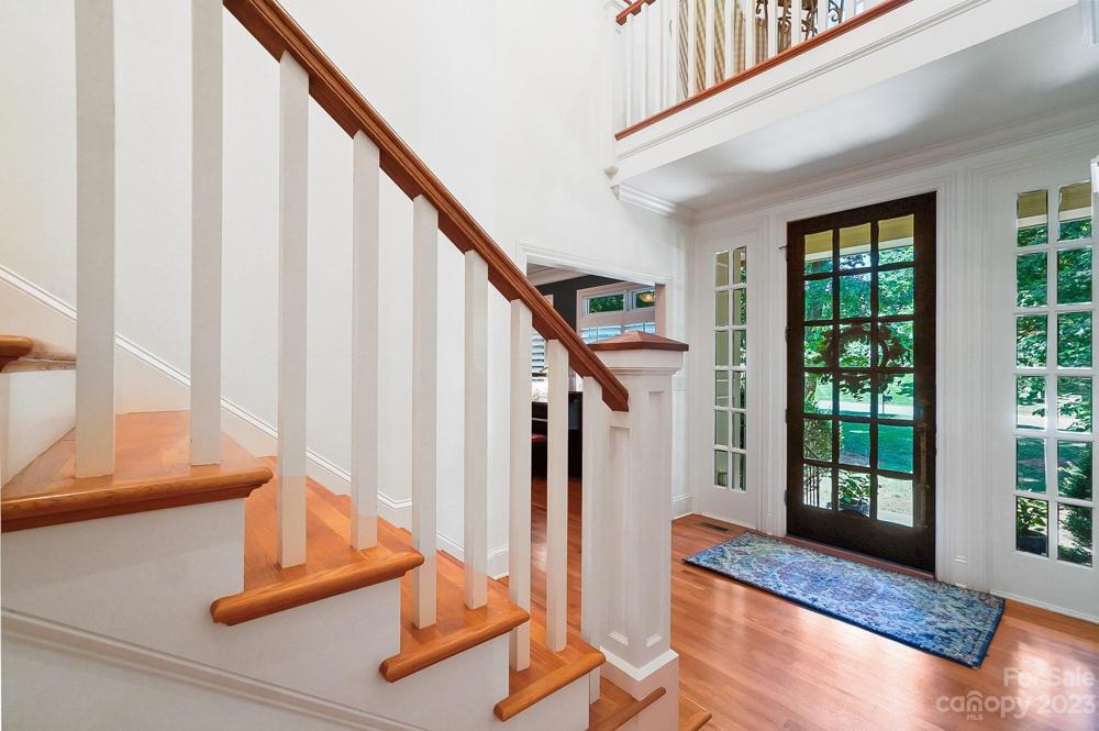 Foyer with wooden doors