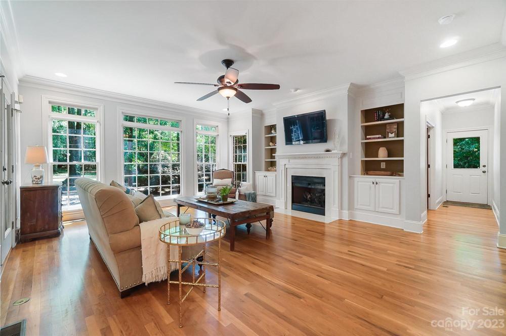 Spacious Living room with gas fireplace and built ins