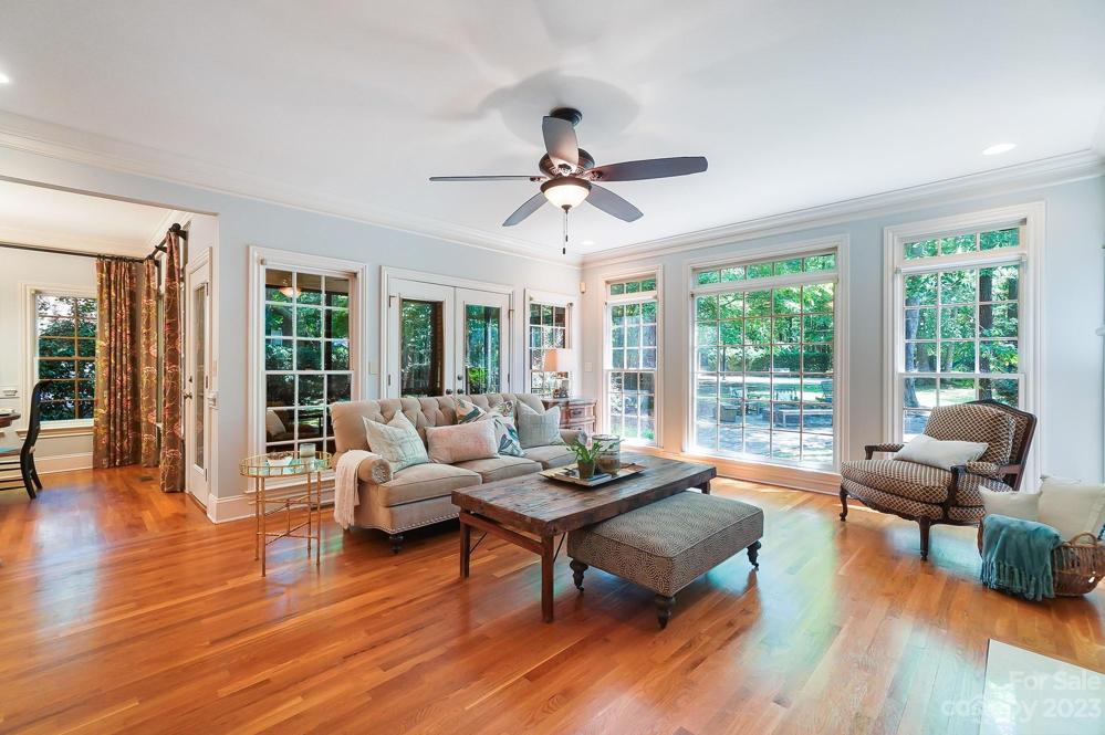 Living room opens to the kitchen and sunroom