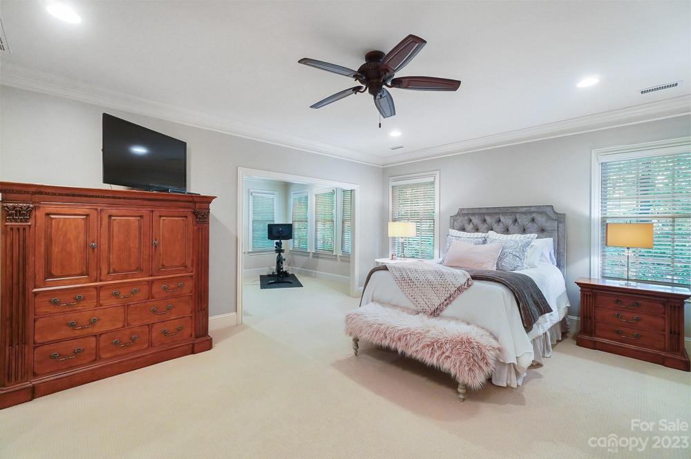 Large primary bedroom with office/sitting room
