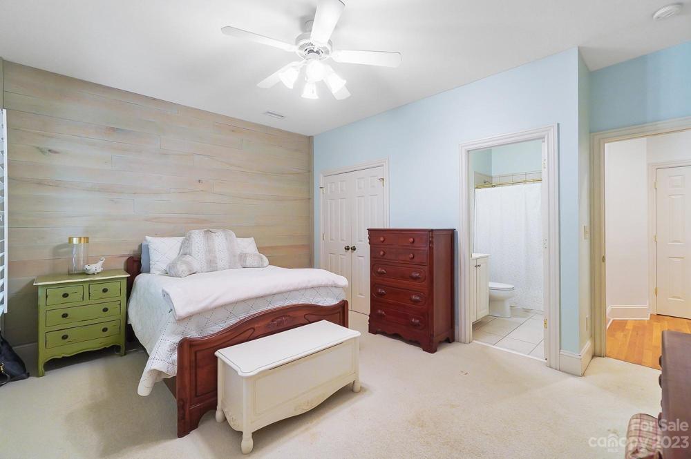 Bedroom 4 with wooden accent wall