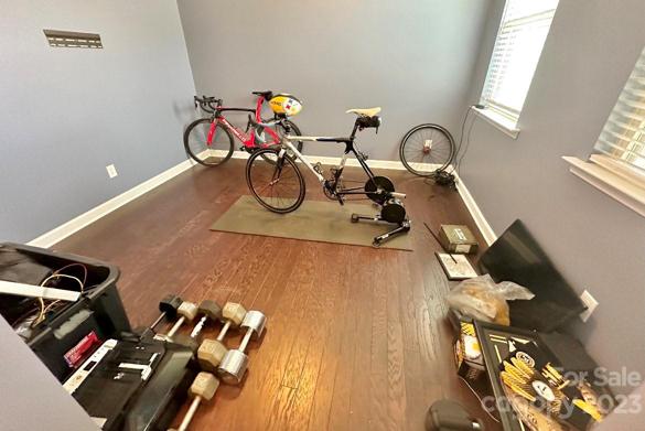 A flex space workout area or craftroom is a great hideaway area downstairs