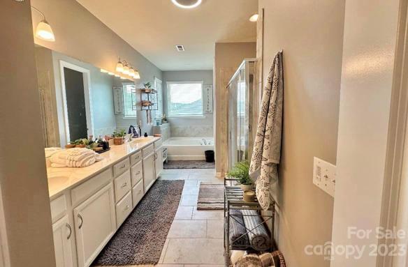 The Primary bathroom located inside of the oversize bedroom