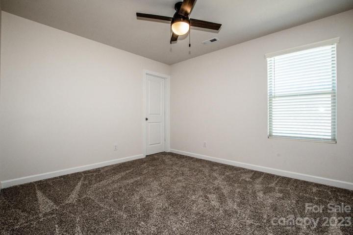 3rd bedroom with ceiling fan