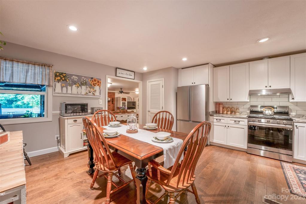 Bright Kitchen with recessed lighting and stainless steel appliances