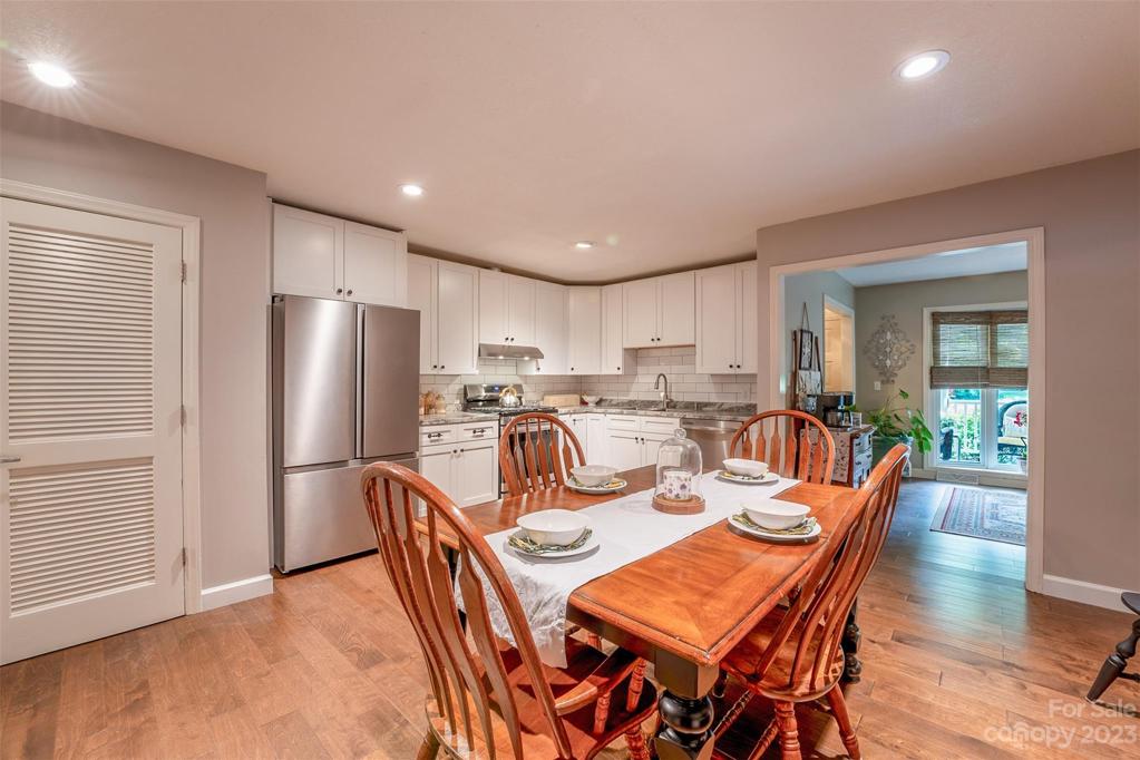 Dining area in kitchen, but could also be a perfect place for a huge center island