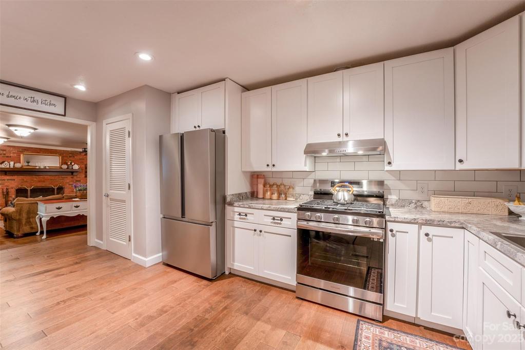 Kitchen leading to the sunken living room