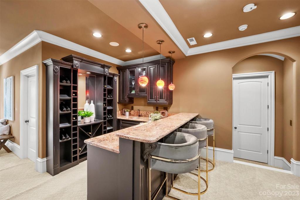 Movie/flex room on third floor with elevator door