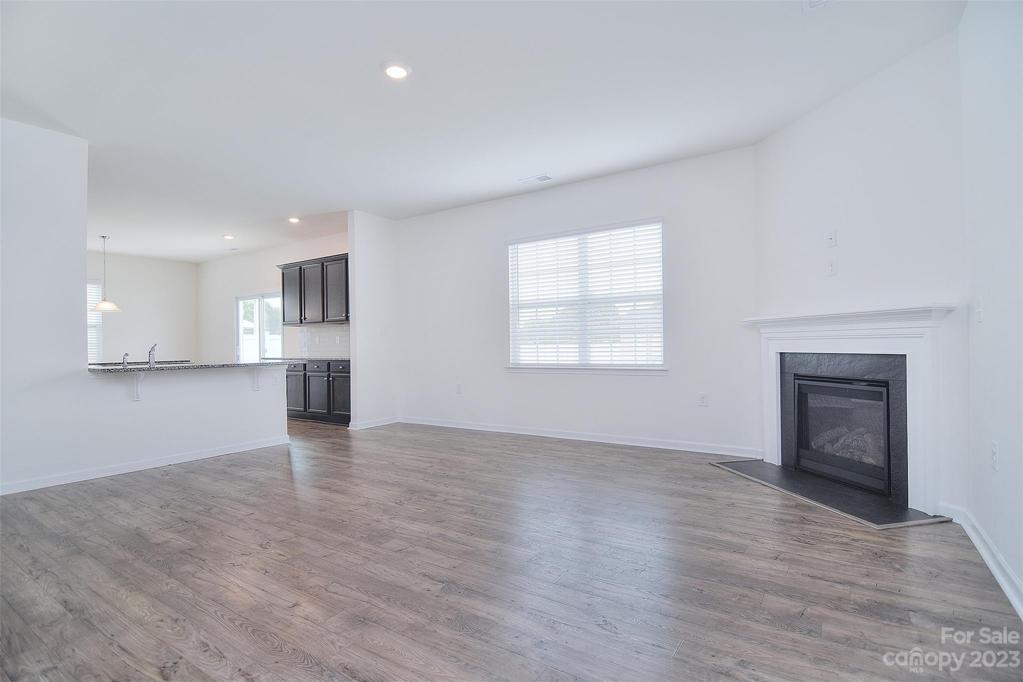 Kitchen and breakfast area are accessible from the family room
