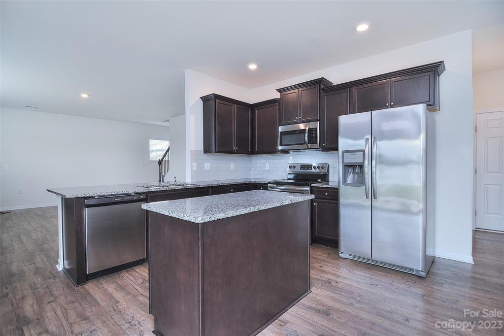 Kitchen houses SS appliances