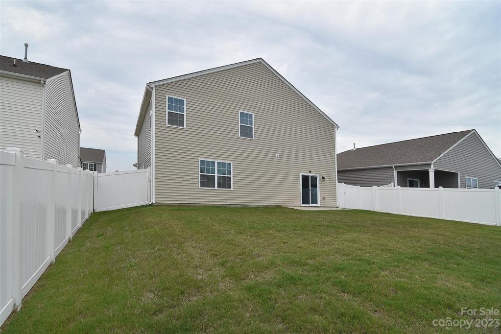 The backyard is completely fenced in!