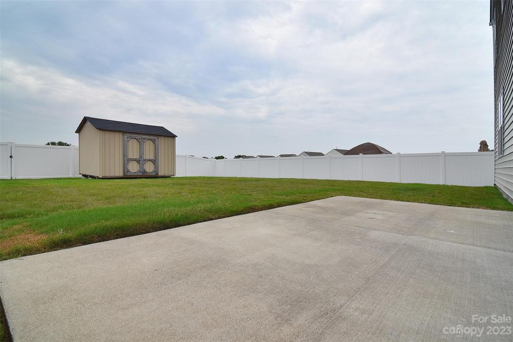 Backyard also includes large shed