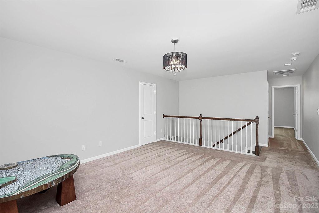 Upstairs loft with walk-in attic storage