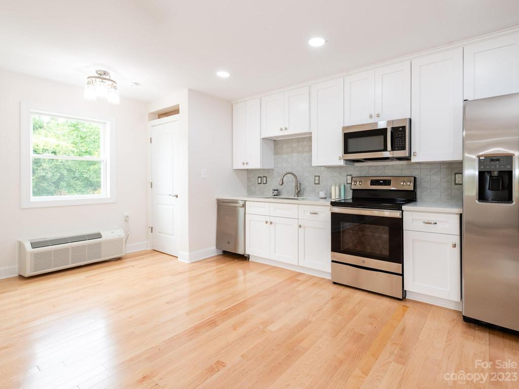 Representational Photo - Upstairs kitchen and dining area