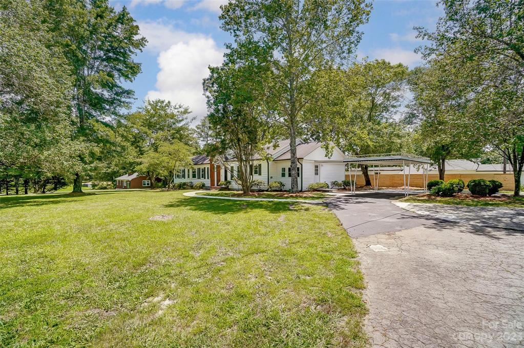 Let the nature greet you as you approach the circular front drive.