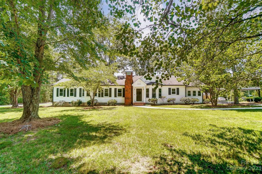 The mature landscaping amplifies this .89 Acre lot.