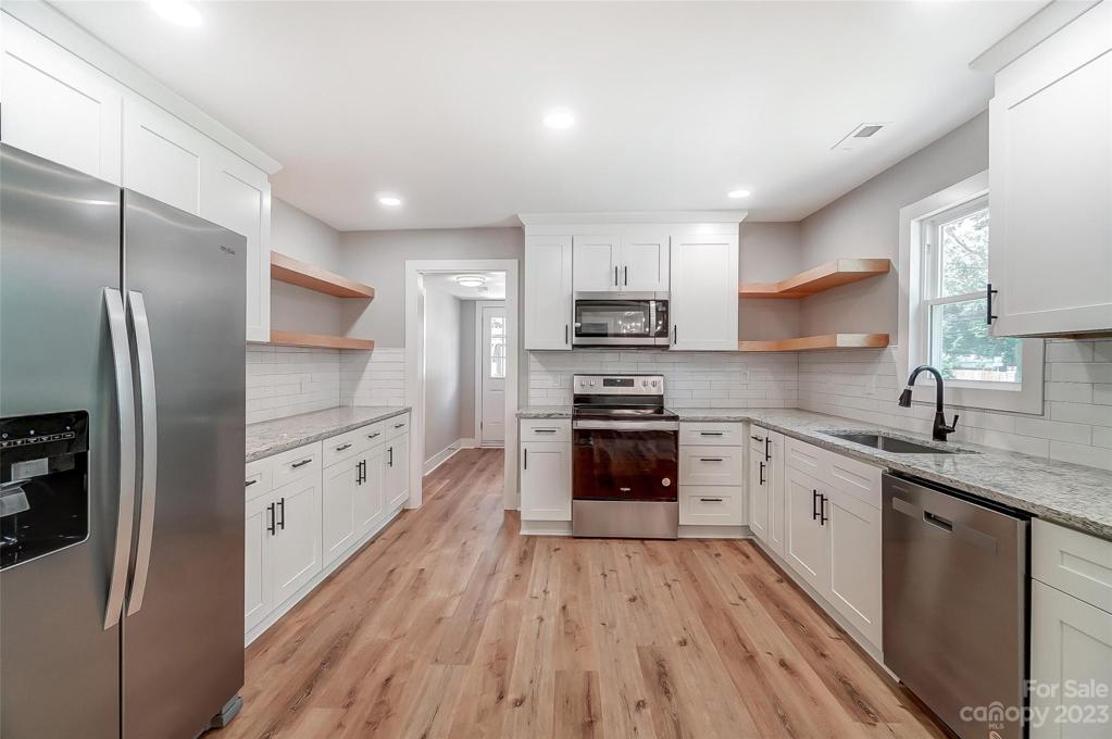 Stainless Steel appliances compliment this beautiful kitchen.