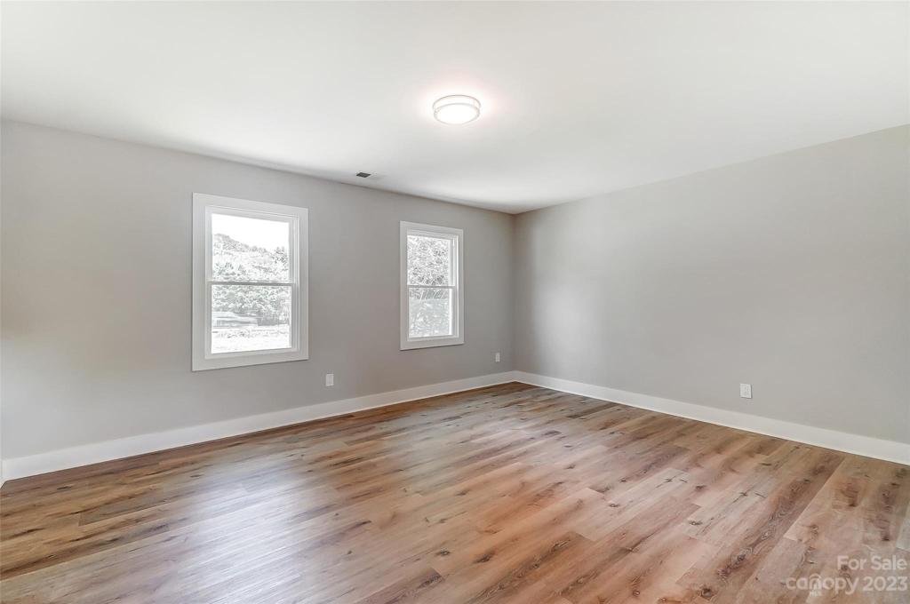 Primary bedroom is massive and will surely fit your favorite bedroom suite.
