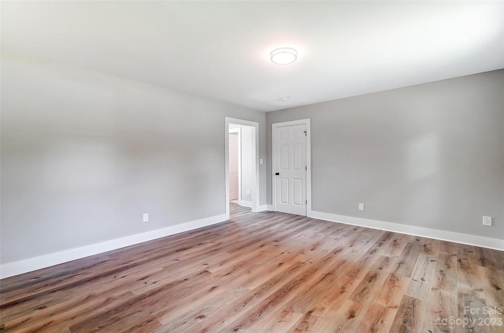 Easy access to the primary bathroom and walk-in closet.