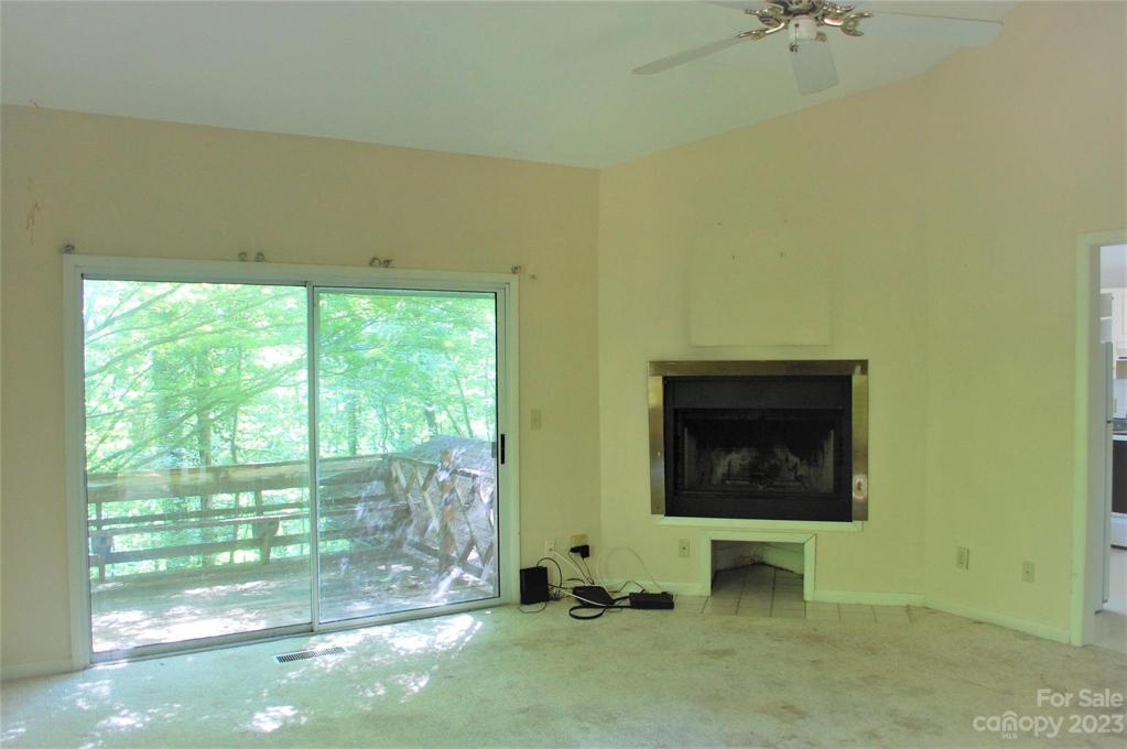 Living room with doors to the deck