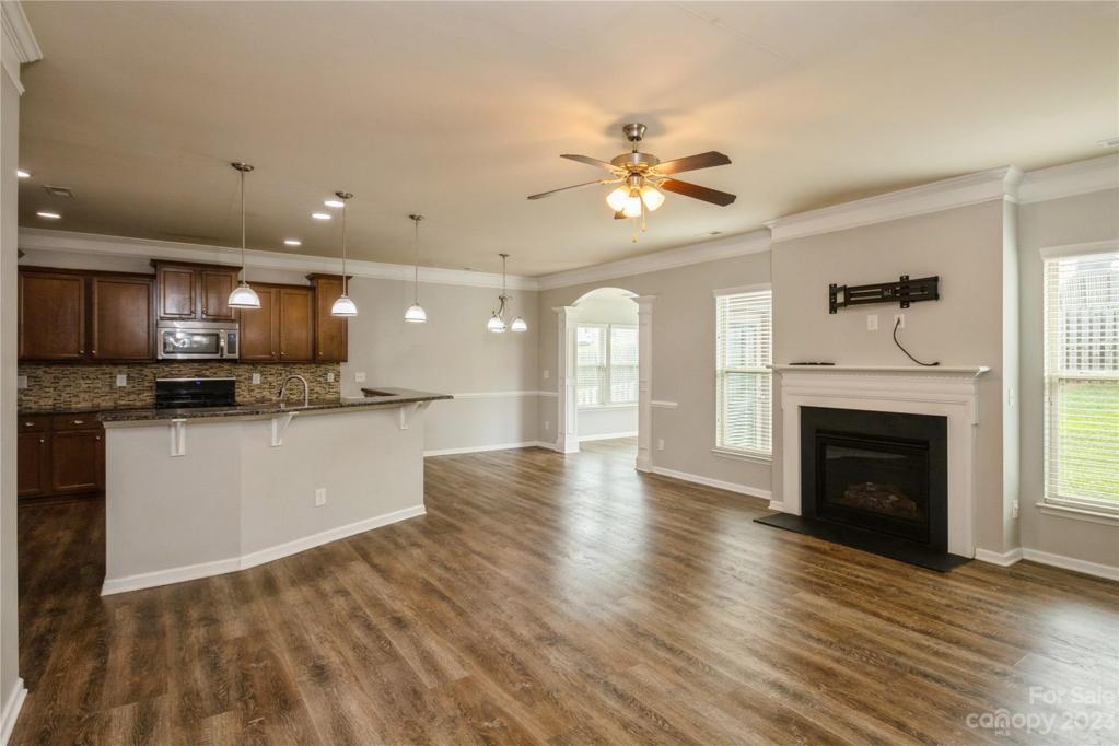 Open Kitchen, Dining Area, Family Room with Fireplace