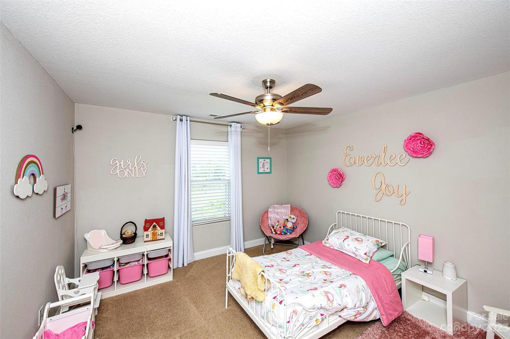 Two of two identically decorated "twin bedrooms"