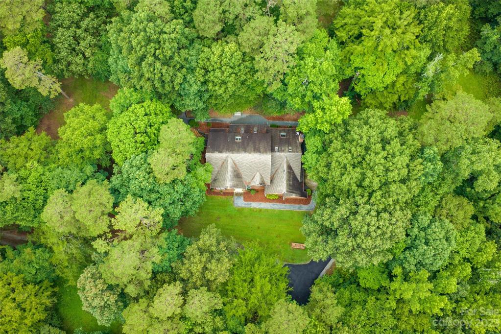 Home is nestled in the trees providing great privacy!