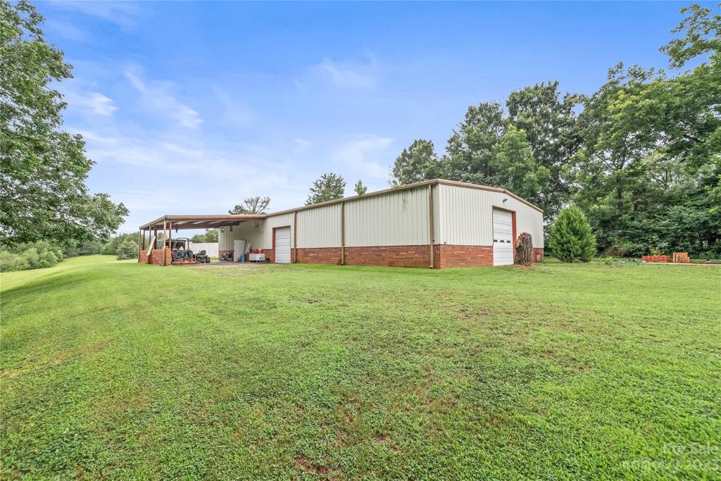 5000 Sq Ft Automotive Garage with 1000 Sq Ft covered patio to be used for whatever you desire!