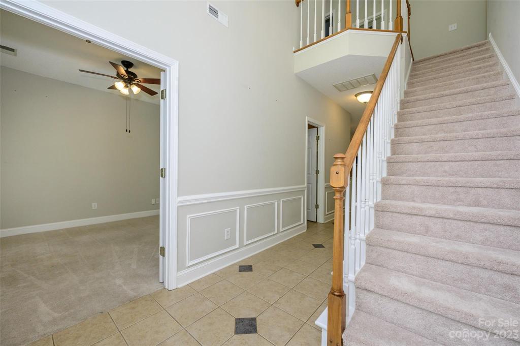 guest bedroom/office/playroom to the left of the entryway