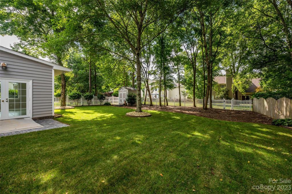 Spacious fenced back yard. Plenty of entertaining and playing space.