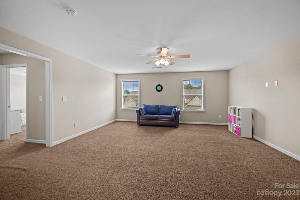 This loft/bonus room can be divided to add a 4th bedroom.