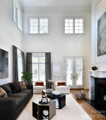 Two Story Living Room: custom moldings throughout. Note all hardwood floors refinished throughout.