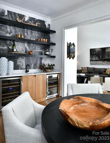 WET BAR with two wine refrigerators.