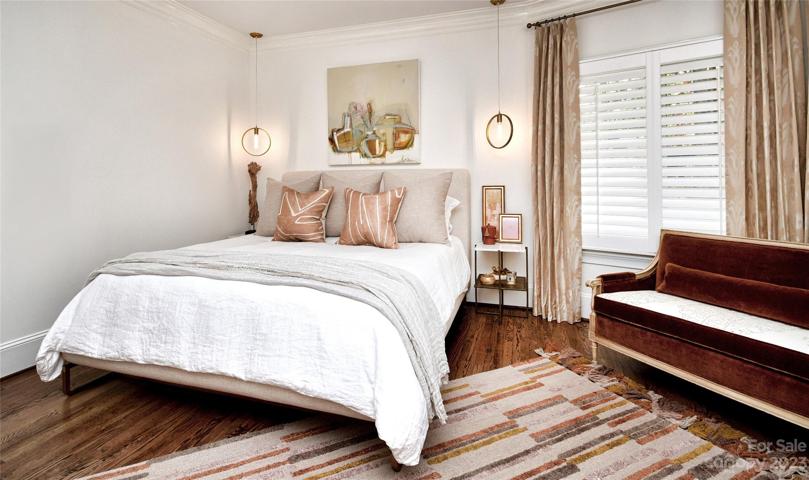 OWNERS SUITE: refinished wood floors in closet and primary suite area.