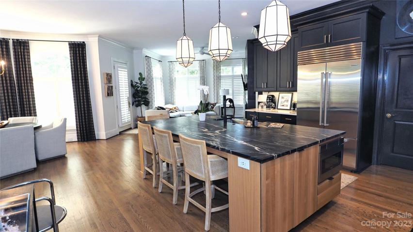 Leathered belvedere quartzite (natural stone) countertop on island.