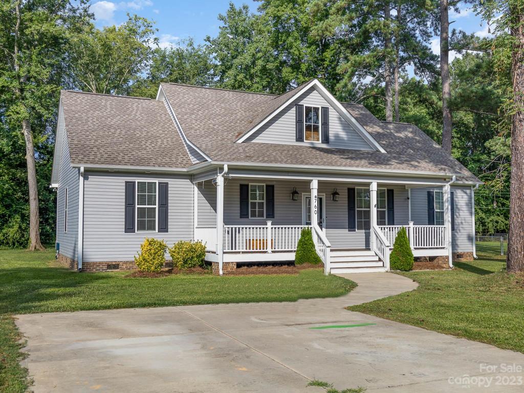 Front Of House with big driveway