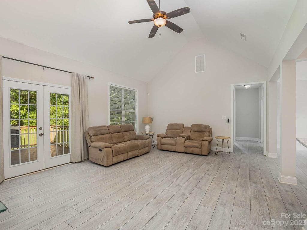 Living Room with access to backyard & deck