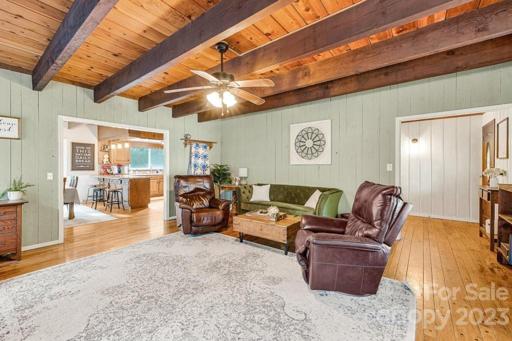 Living Room with a view of the Dining Room and Kitchen