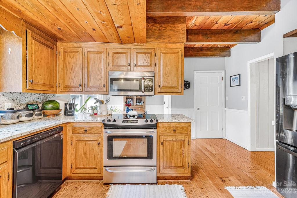 Kitchen is open to the Dining Room and Breakfast area.