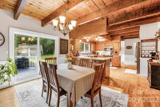 Dining room with new sliding doors. Enjoy your coffee in the evening on the huge deck!