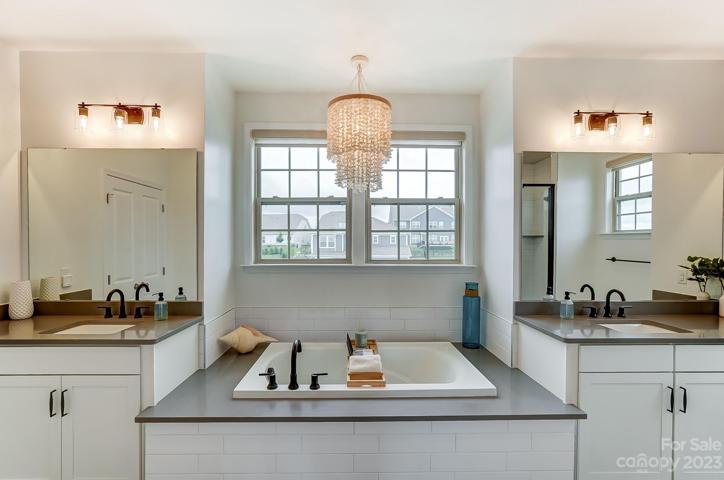 Spacious primary bathroom with garden tub